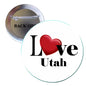Round pinback button with red heart and black "Love Utah" text
