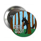 2.25-inch pinback button with black wolf silhouette on blue-brown striped forest
