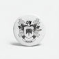 Round Wotton family crest coat-of-arms magnet with shield and ribbon, black on white