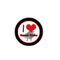 Round pinback button with black border, red heart, grand piano silhouette, and “Grand Piano” text