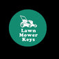 Round green keychain charm with white lawn mower and Lawn Mower Keys text