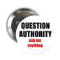 Round silver pinback brooch, black center with 'QUESTION AUTHORITY' and 'ask me anything'.