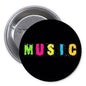 1.25-inch black pinback button with multicolor “Music” lettering