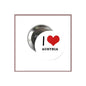 Round Austria button pin with red heart and “I ♥ Austria” text