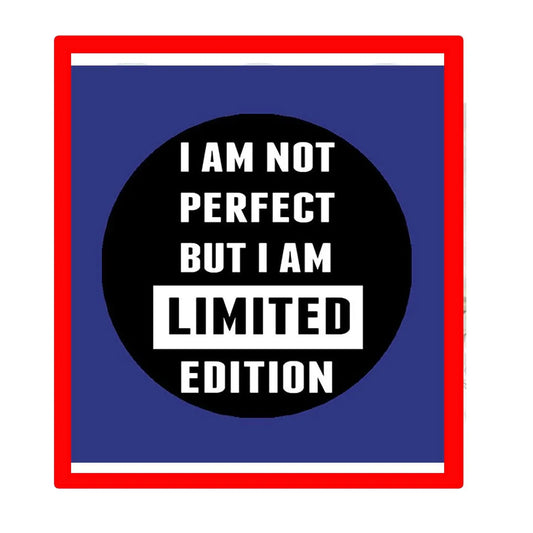 2.25-inch black pin-back badge with bold white text 'I AM NOT PERFECT'