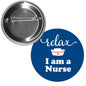 Nurse themed pinback button: blue 'Relax I am a Nurse' text with red cross, silver back