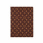 Maroon passport cover holder with repeating gold geometric pattern