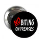 1.25-inch pinback button with “NO BITING ON PREMISES” text, red and white on black