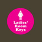 Round pink keychain tag with ladies restroom icon and text "Ladies' Room Keys"