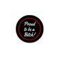 2.25-inch pinback button, black with red ring and white script 'Proud to be a Bitch!'