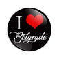 Round black pinback button with red heart and white “I Belgrade” text