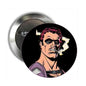 Round pinback button with colorful cartoon face illustration and silver metal backing