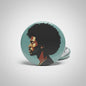 Teal round pinback button with stylized afro man profile illustration