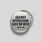 2.25-inch pinback button, silver with black 'AGAINST OPPRESSION EAST OR WEST' text