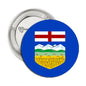 Alberta flag pinback button, round 1.25-inch badge with blue border