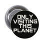1.25-inch alien pinback button, black with white 'Only Visiting This Planet' text