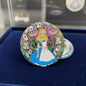 2.25-inch round pinback button with Alice in blue dress and smiling cat faces