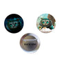 Two round Cheshire Cat themed magnets: teal cat face fronts, silver back with 'BACK SIDE'.