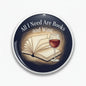 Books and wine pinback button with open book and red wine glass illustration