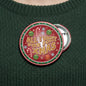 Christmas pinback button with “All I Want for Xmas” text and festive icons