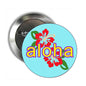 Round turquoise Hawaiian pin with colorful “aloha” lettering and red hibiscus flowers