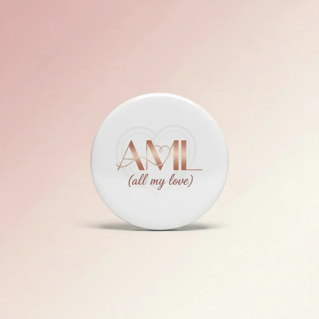 2.25-inch white round pinback button with "AMl" and "(all my love)" text
