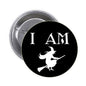Black witch pinback button with “I AM” text and white witch silhouette