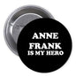 1.25-inch pinback button with black face and text 'ANNE FRANK IS MY HERO'
