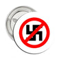 Small pinback badge with red slash over black symbol on white background