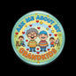 Round pinback button with cartoon kids and text 'Ask Me About My Grandkids'