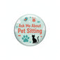 Round pinback button with cat silhouette and 'Ask Me About Pet Sitting' text