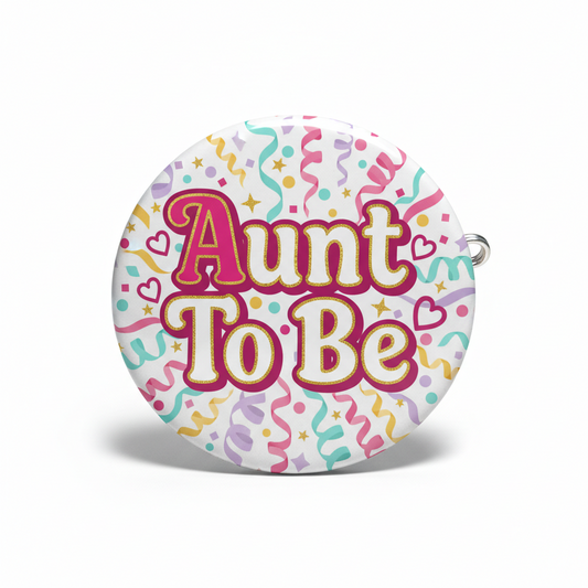 2.25-inch round Aunt To Be pinback button with colorful confetti border