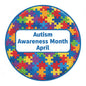 Autism awareness month April pinback button with colorful puzzle piece design