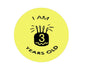 Round yellow pinback button with black text “I AM 3 YEARS OLD” and candle cake icon