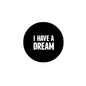 Black pinback button with white text "I HAVE A DREAM"