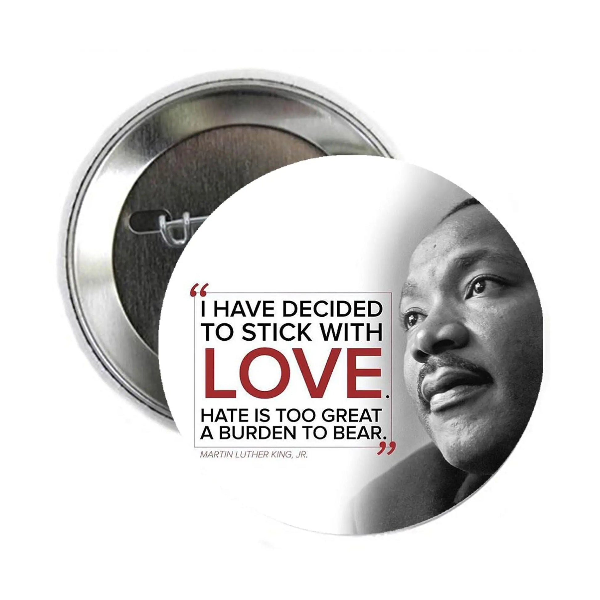 Round metal pinback button with Martin Luther King Jr. portrait and 'stick with love' quote