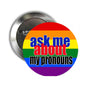 Rainbow pronouns pinback button reads: ask me about my pronouns