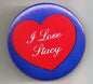 1.25-inch pinback button with blue border, red heart, and white “I Love Stacy” text