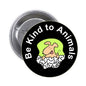 Round black pinback button with "Be Kind to Animals" text and green animal illustration