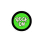 Round pinback button brooch with black rim and green center reading 'ROCK ON'.