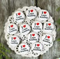 Round pinback buttons set with red heart and “I Lawn Bowling” text, white background