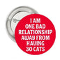 Red round pinback button with slogan text, I AM ONE BAD RELATIONSHIP