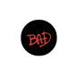 2.25-inch black pinback button with red 'BAD' graphic