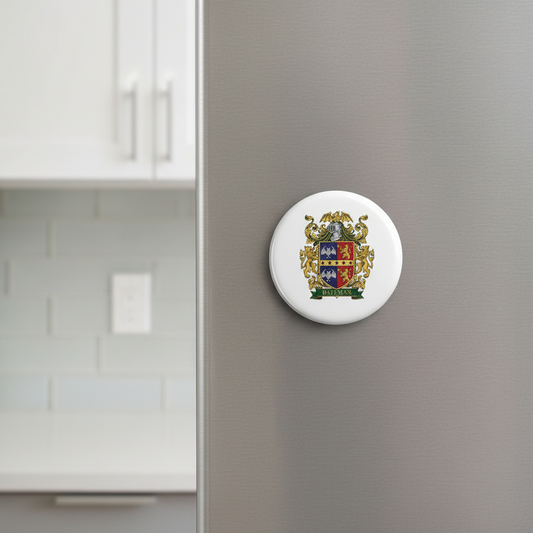 Round family crest coat of arms magnet on gray wall