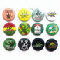 Set of 12 round cannabis-themed pinback buttons, colorful leaf and grass designs