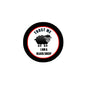 2.25-inch black pinback button with red ring, sheep graphic, and 'TRUST ME I AM A BLACK SHEEP'