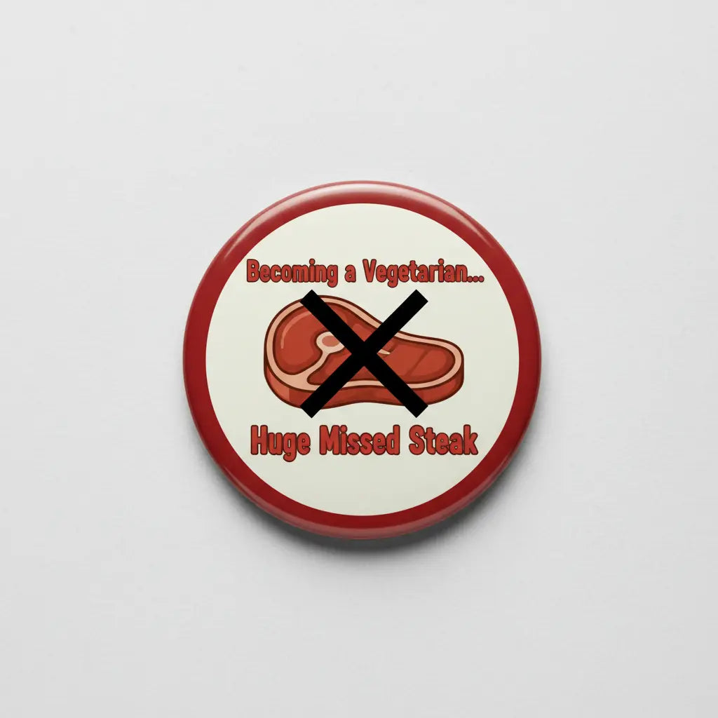 Round red pinback button with vegetarian text and crossed steak icon