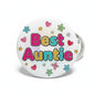 Round pinback button with "Best Auntie" text, hearts, stars, and flowers in color