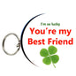 Round bottle opener keychain with 'You're my Best Friend' text and green clover design