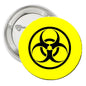 1.25-inch bio hazard symbol button pin, yellow with black trefoil logo.